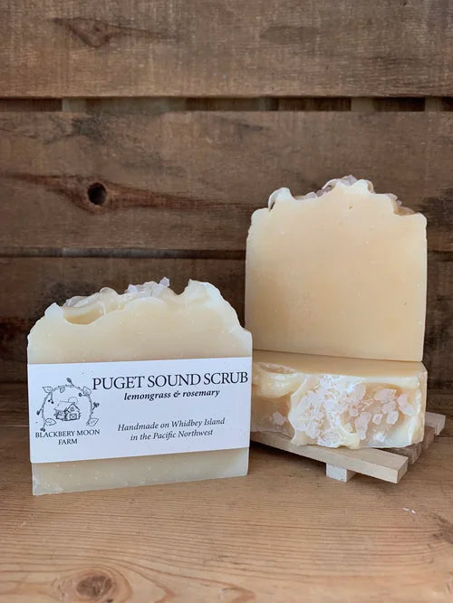Puget Sound Scrub handmade soap bars with natural textured design displayed on a wooden stand