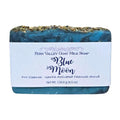 Blue Moon goat milk soap bar with activated charcoal scrub on white background