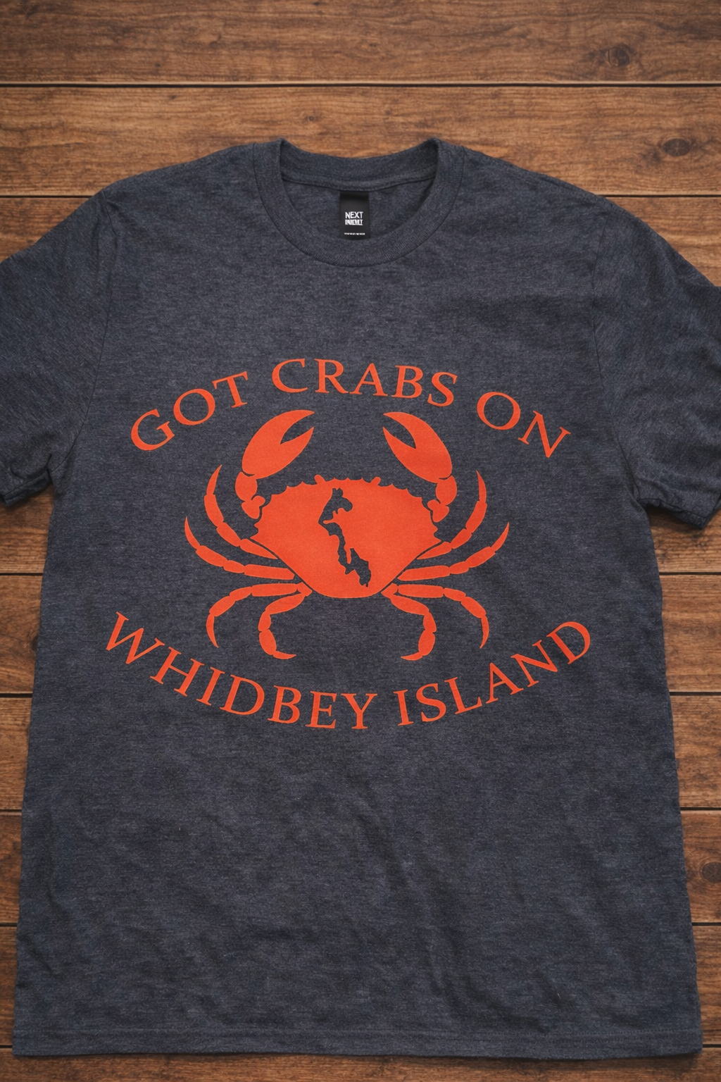 Dark gray t-shirt with red crab graphic that says Got Crabs On Whidbey Island.
