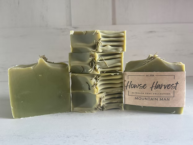 Handmade Mountain Man soap bars stacked with label on white background