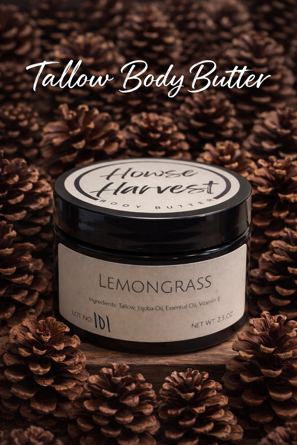 Lemongrass tallow body butter in dark jar on pinecone background